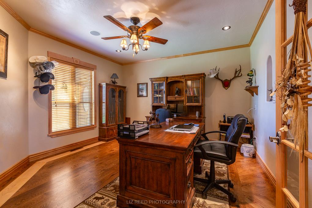 1296 O Road Loma, CO 81524 - Photo 18 of 41 a view of a dining room with furniture window and wooden floor