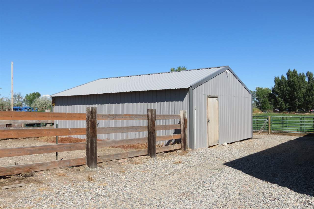 1296 O Road Loma, CO 81524 - Photo 37 of 41 a view of a house with a backyard