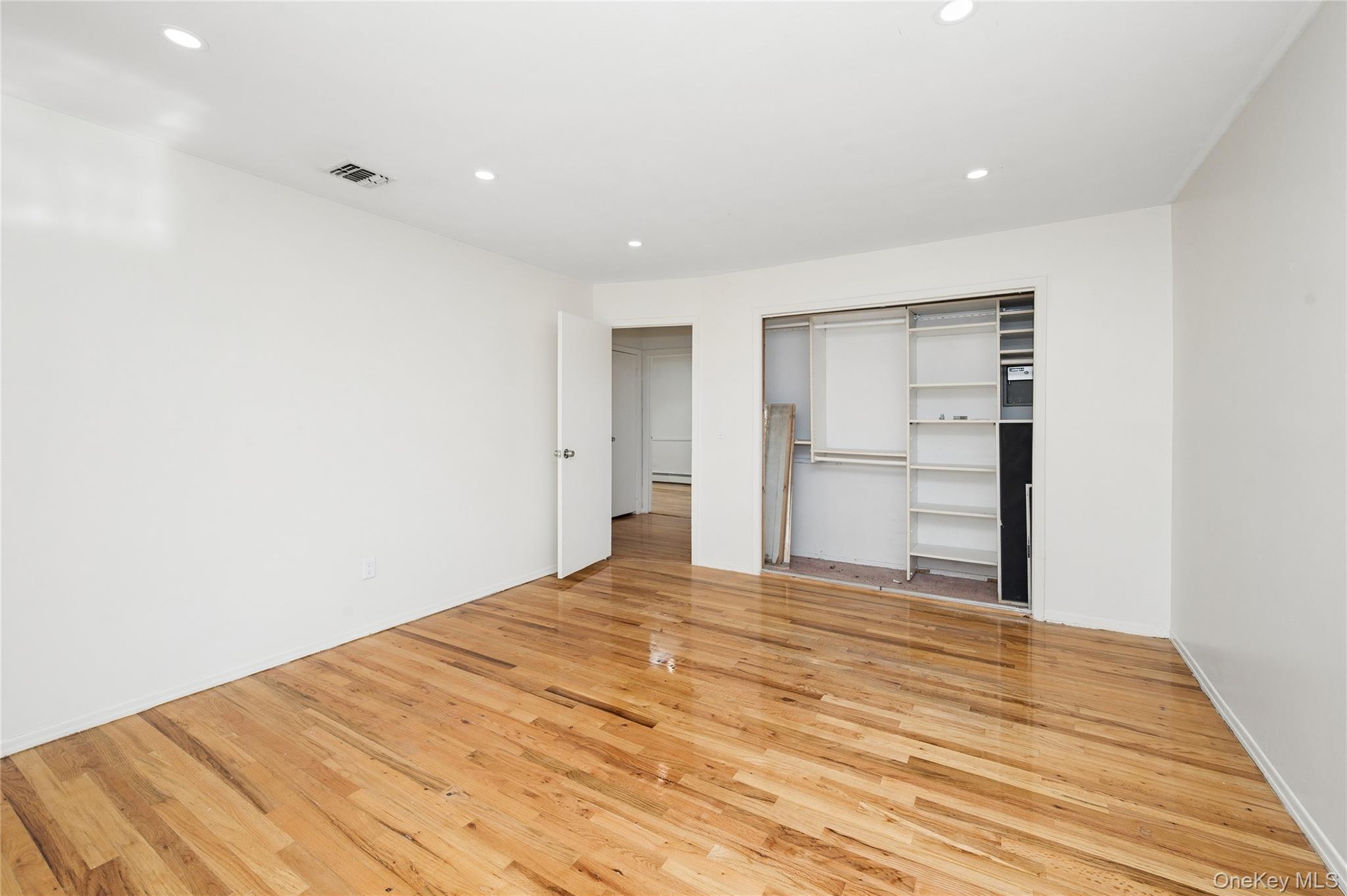 2625 Riverside Drive Wantagh, NY 11793 - Photo 17 of 20 a view of an empty room with closet and entryway