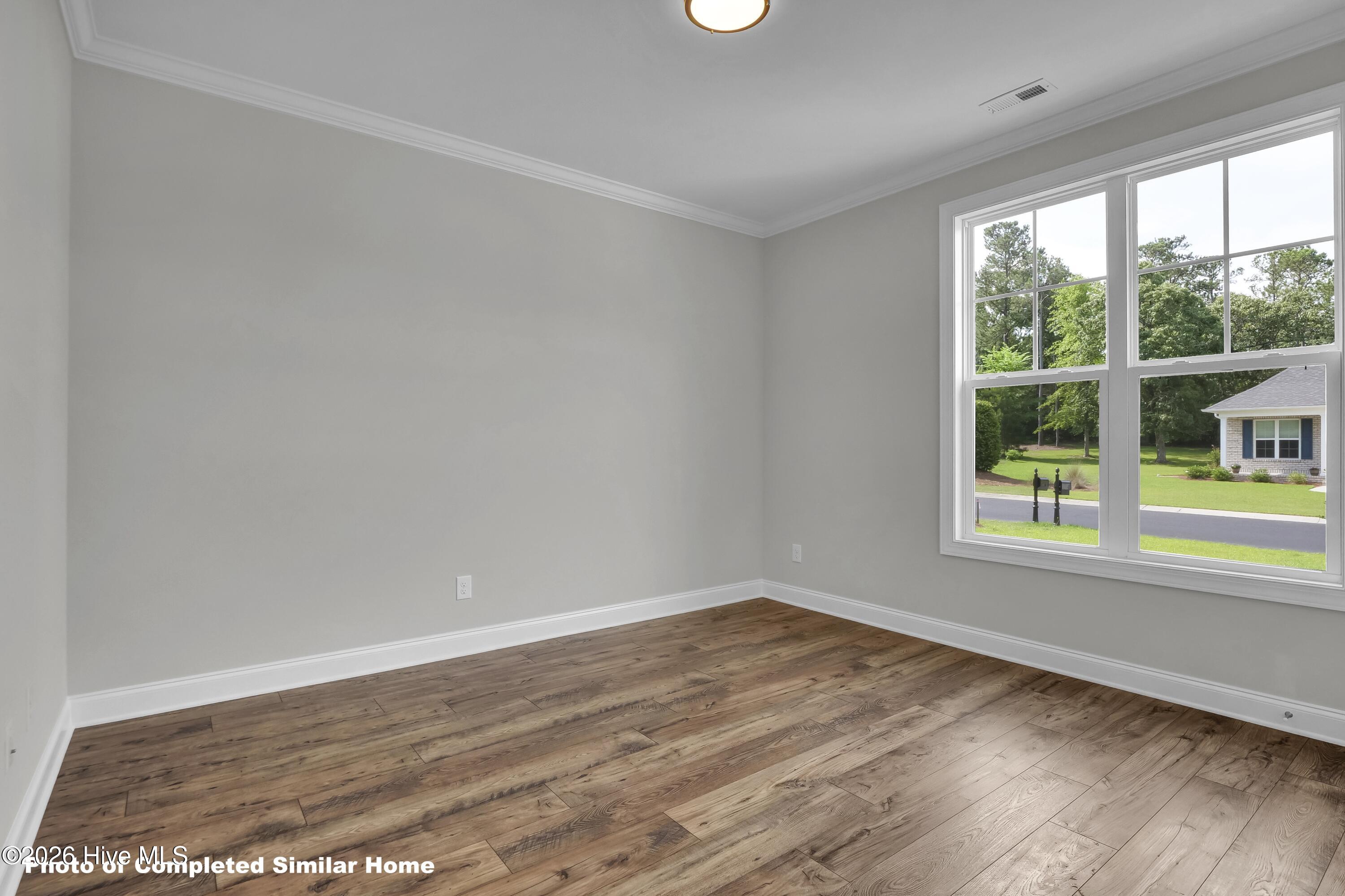 1181 Sabel Loop Southeast Bolivia, NC 28422 - Photo 25 of 35 Photo of Completed American Plan - Finishes and selections may vary. Confirm all selections.