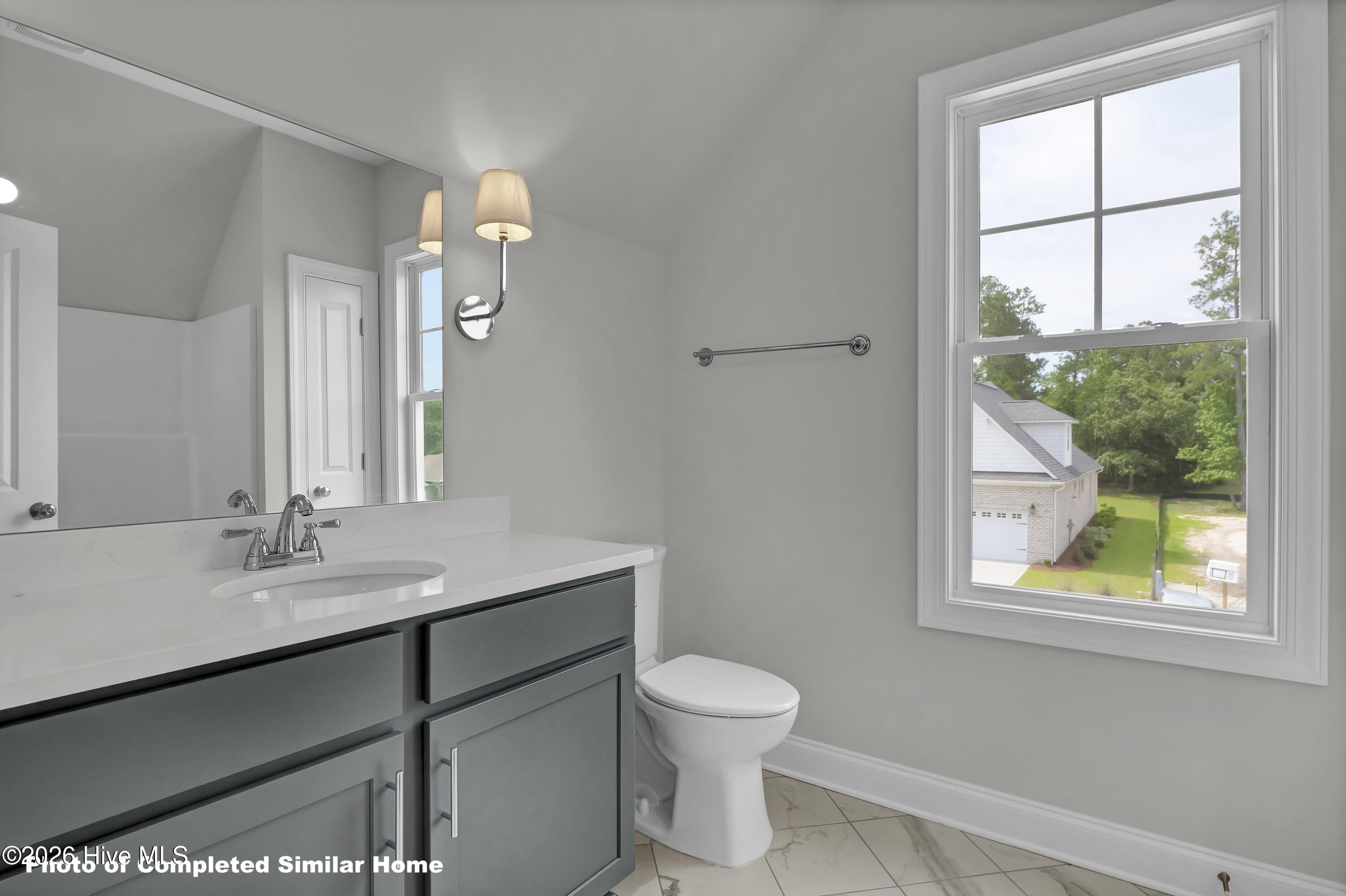 1181 Sabel Loop Southeast Bolivia, NC 28422 - Photo 32 of 35 Photo of Completed American Plan - Finishes and selections may vary. Confirm all selections.