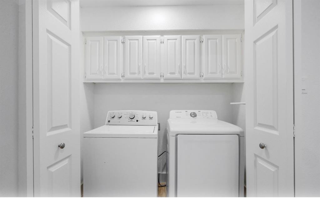5041 Thunder Road Dallas, TX 75244 - Photo 14 of 20 a utility room with dryer and washer