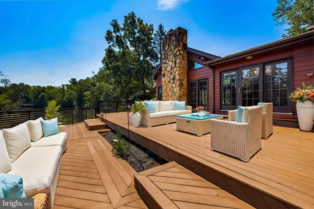 a view of a lake with outdoor seating