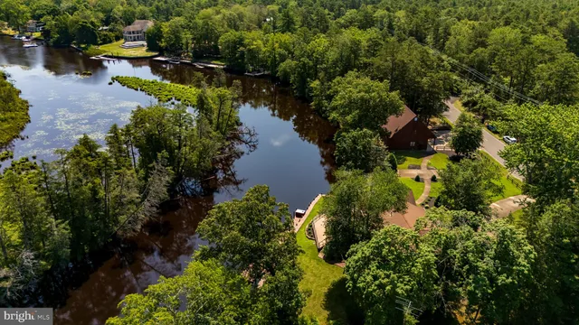 an aerial view of a house roof deck and patio