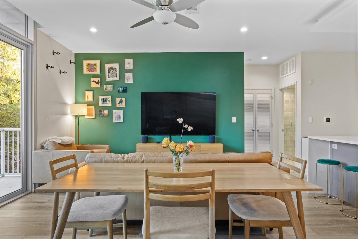 1600 Barton Springs Road, Unit 4205 Austin, TX 78704 - Photo 12 of 37 a living room with furniture and a flat screen tv