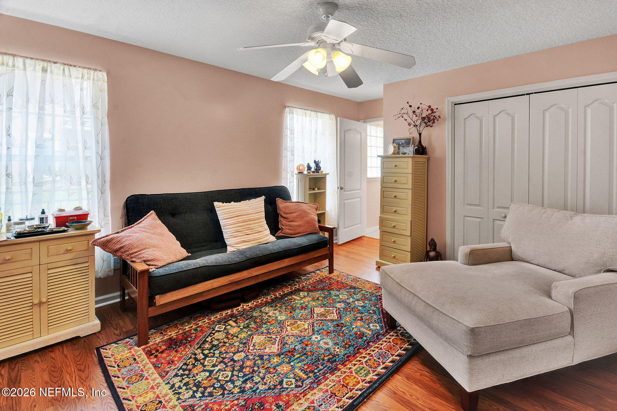 5950 West Shores Road Orange Park, FL 32003 - Photo 32 of 42 a living room with furniture and a rug