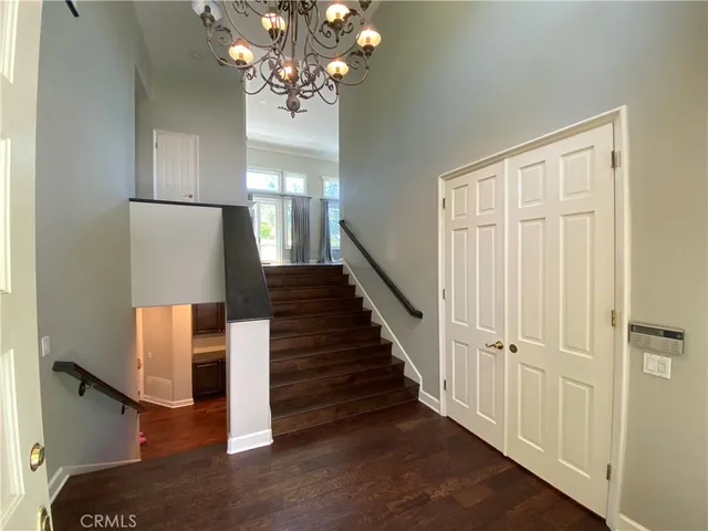 a view of entryway with wooden floor