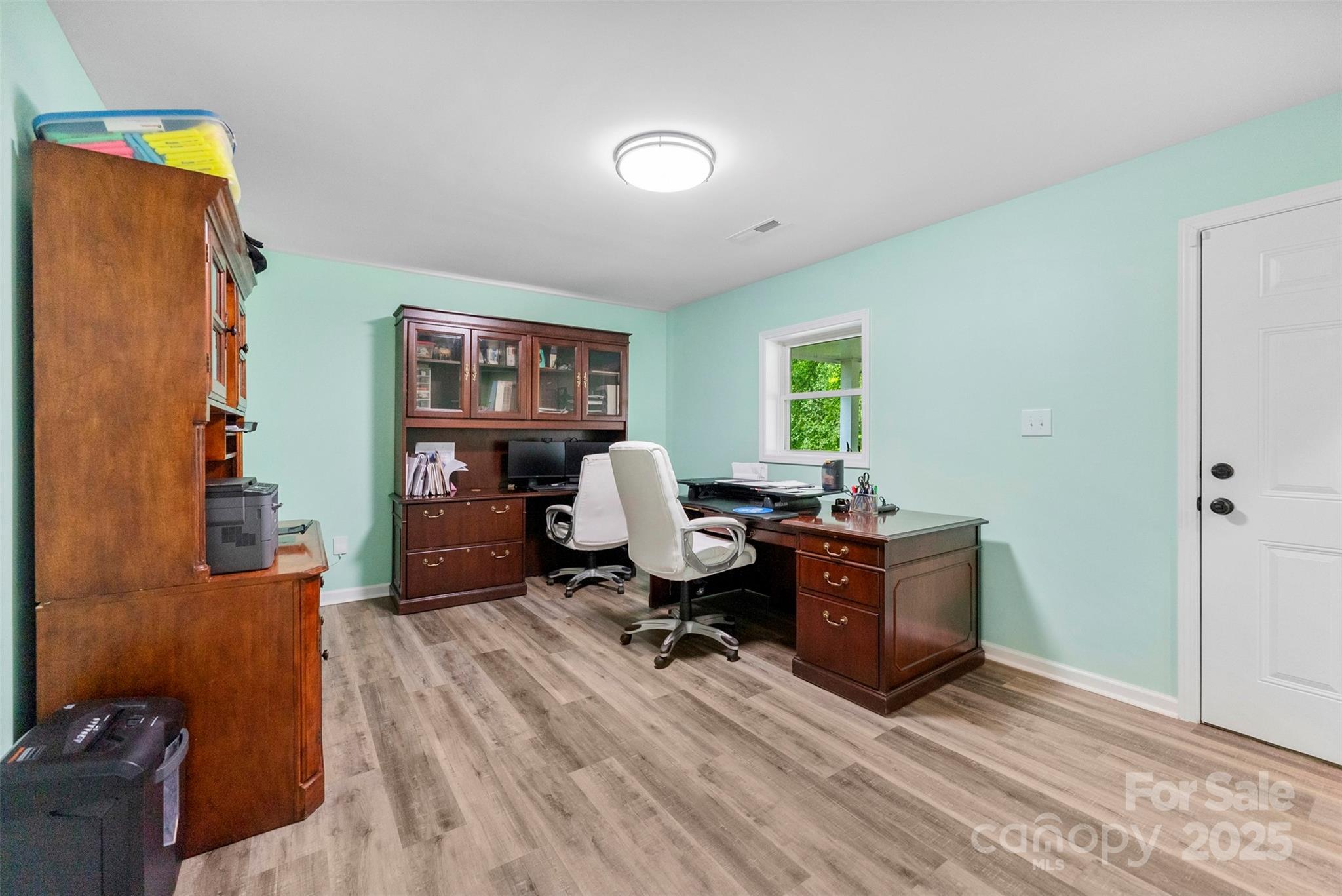 1822 North New Hope Road Gastonia, NC 28054 - Photo 14 of 47 a view of a workspace with furniture and a window