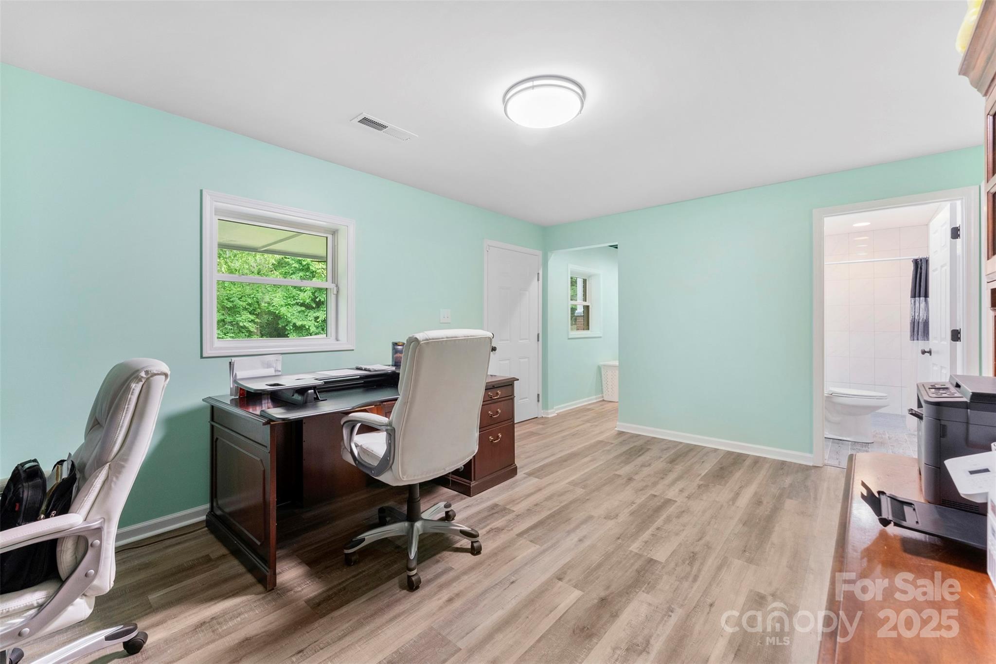 1822 North New Hope Road Gastonia, NC 28054 - Photo 15 of 47 a workspace with furniture and a window