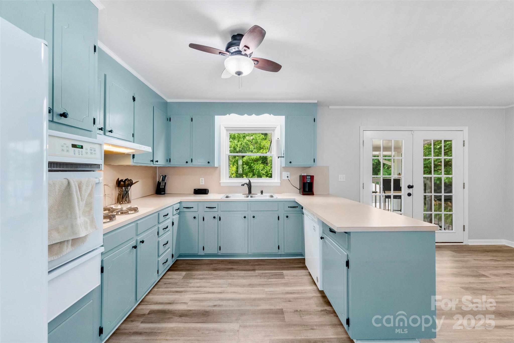 1822 North New Hope Road Gastonia, NC 28054 - Photo 20 of 47 a large white kitchen with a window