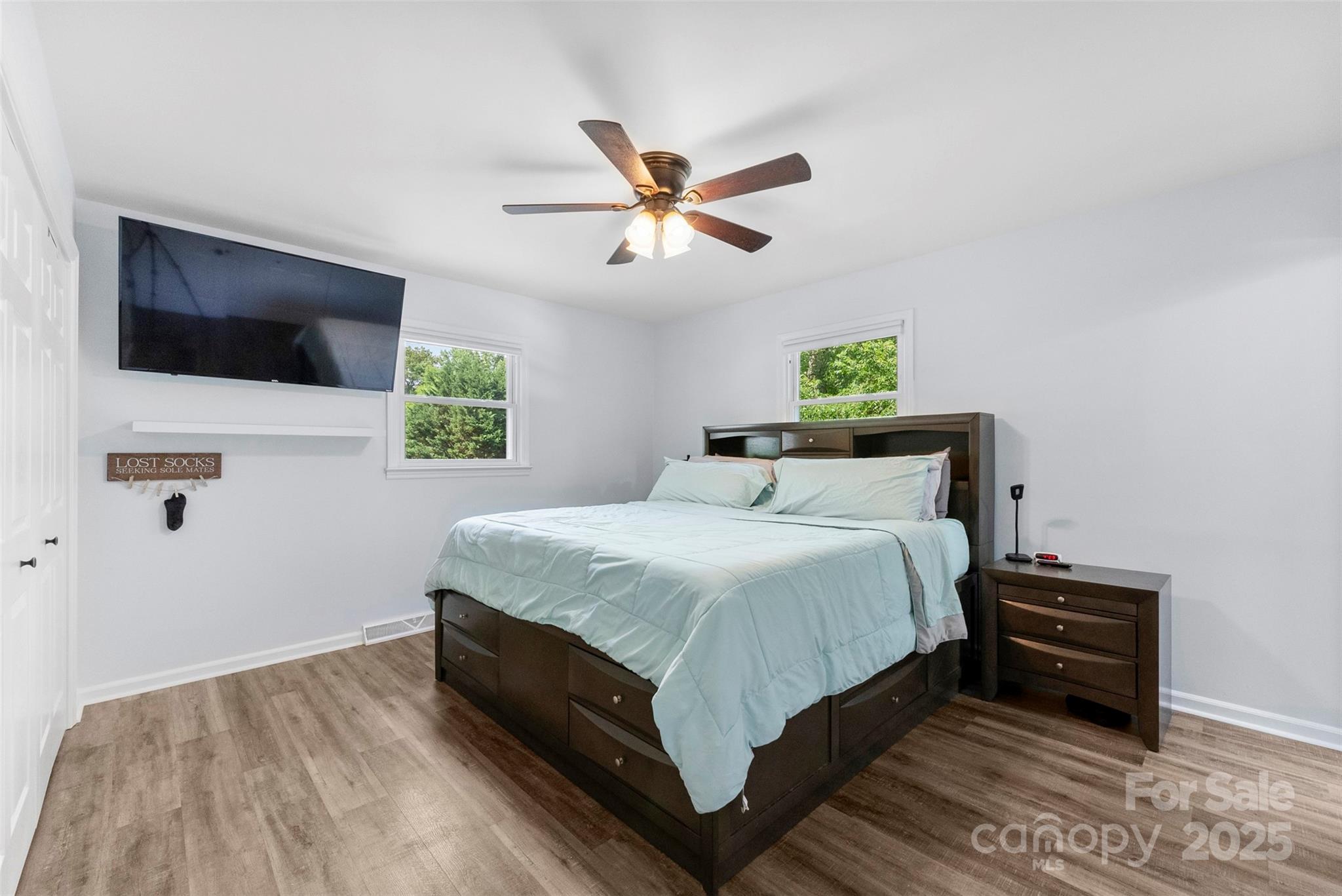 1822 North New Hope Road Gastonia, NC 28054 - Photo 31 of 47 a bedroom with a bed and a flat screen tv