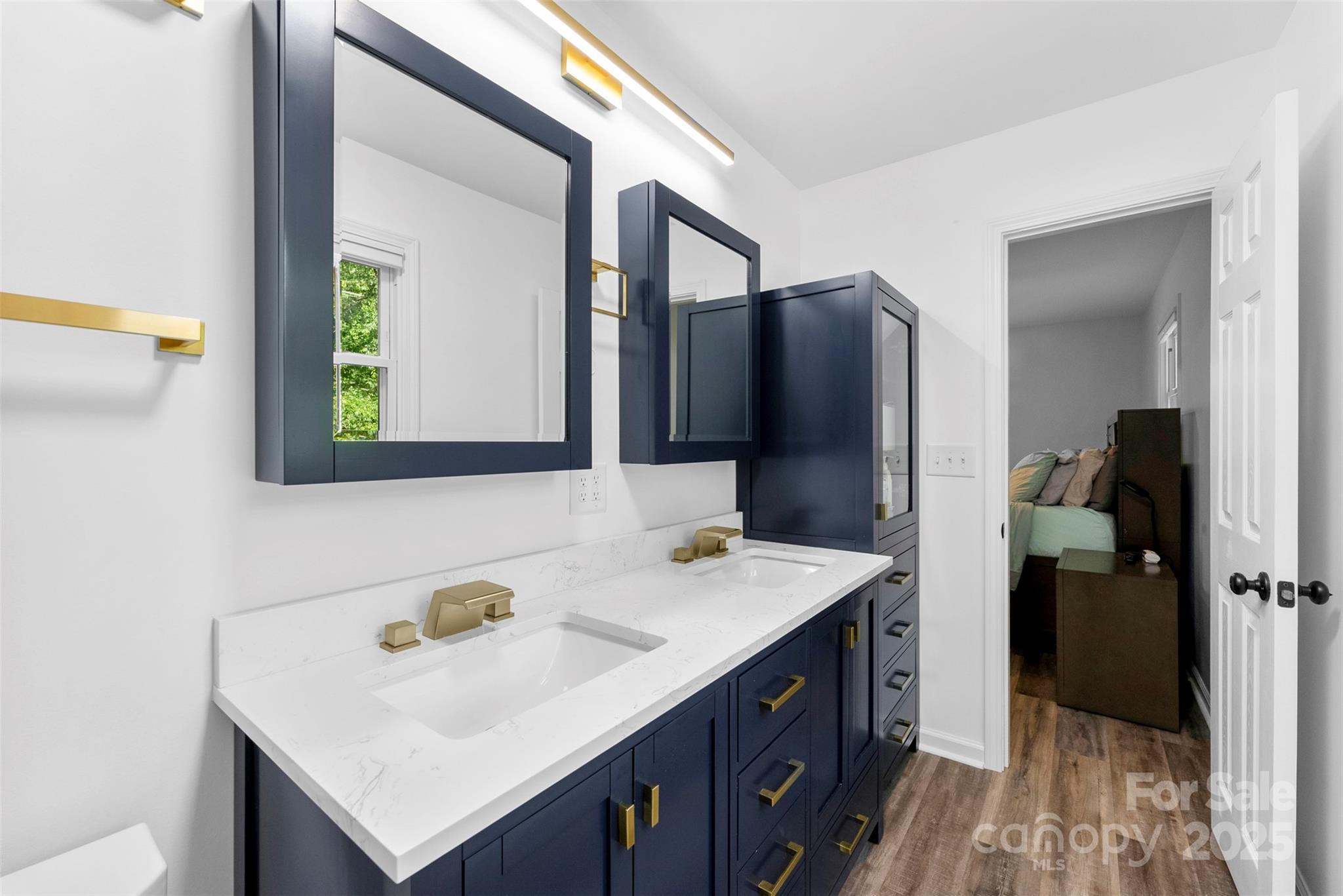 1822 North New Hope Road Gastonia, NC 28054 - Photo 36 of 47 a bathroom with a sink and a mirror