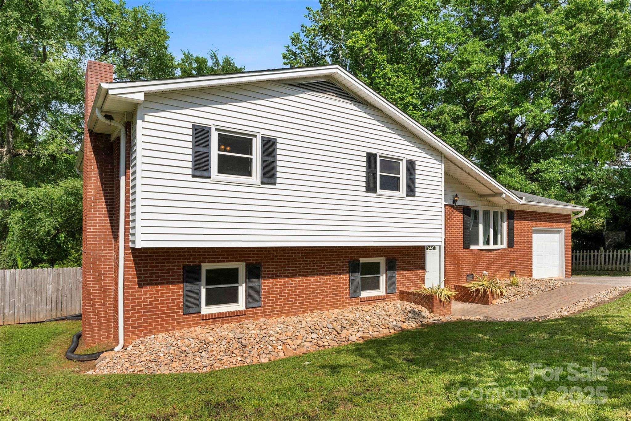 1822 North New Hope Road Gastonia, NC 28054 - Photo 40 of 47 a front view of a house with a yard