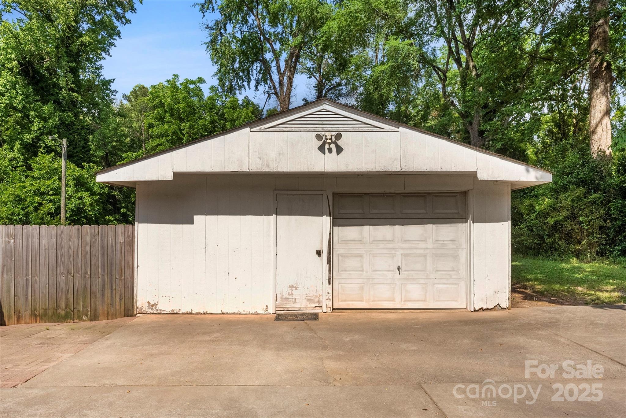 1822 North New Hope Road Gastonia, NC 28054 - Photo 43 of 47 a front view of a house with a garage