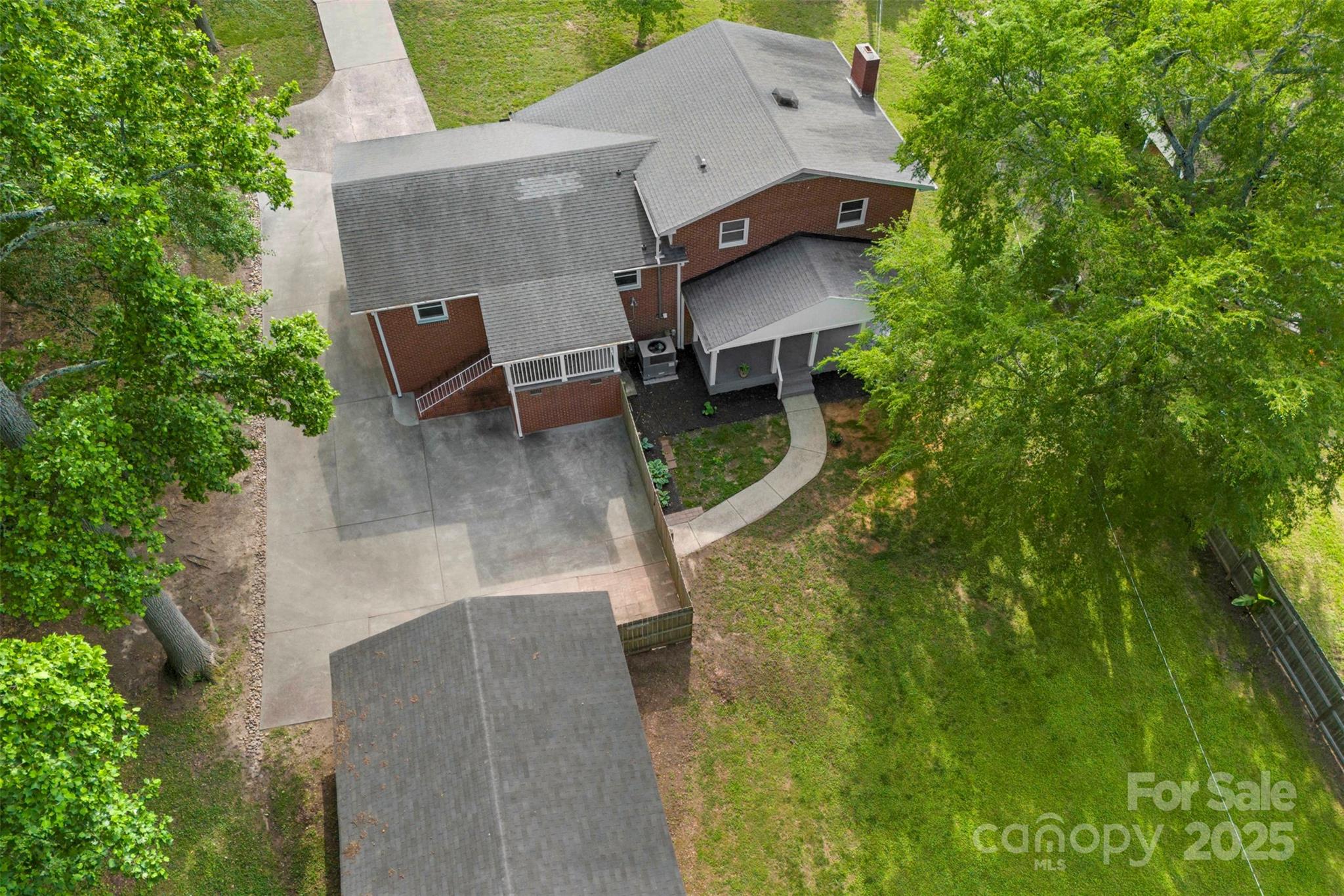 1822 North New Hope Road Gastonia, NC 28054 - Photo 7 of 47 an aerial view of a house with pool yard and outdoor seating