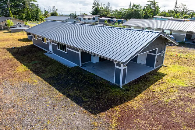 a view of a roof deck with wooden floor and fence