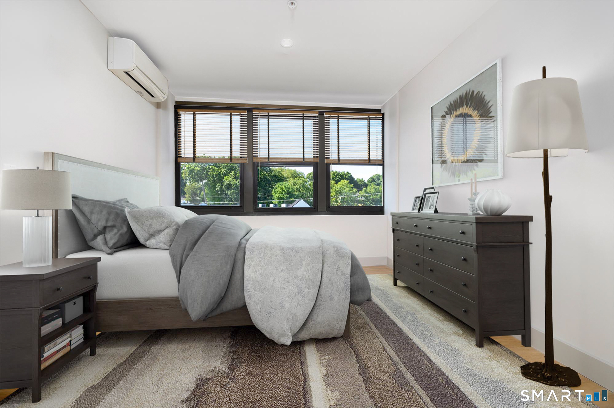 1011 High Ridge Road, Unit 2H Stamford, CT 06905 - Photo 2 of 5 a living room with furniture and a window