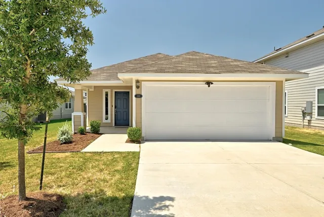 a front view of house with yard