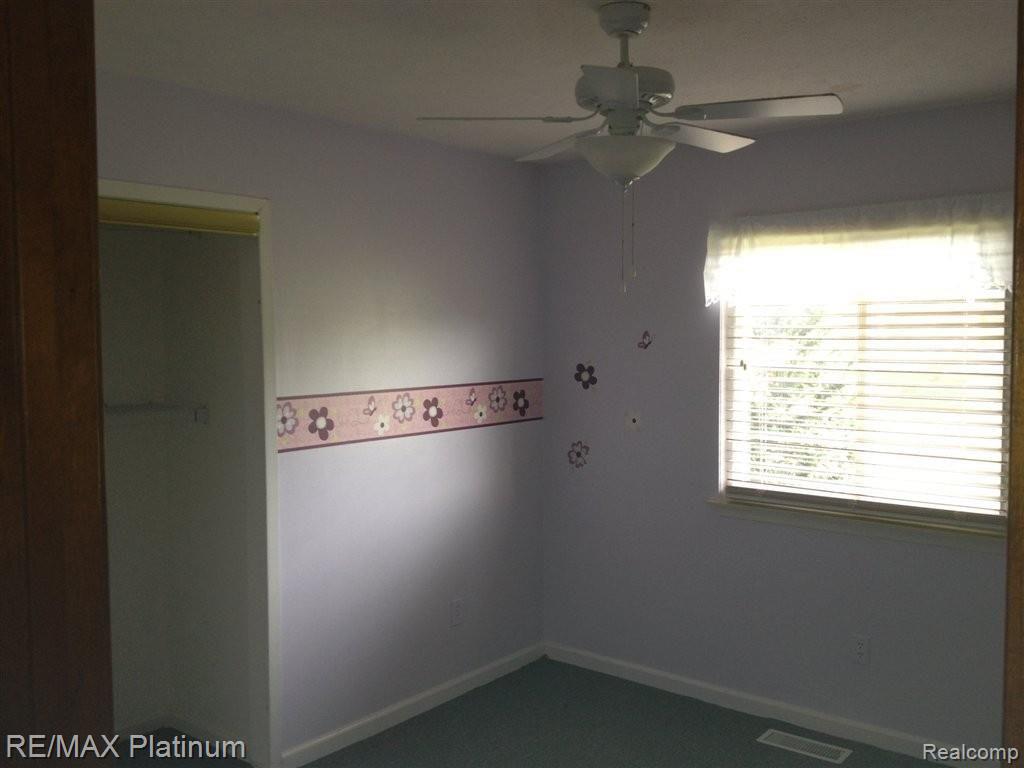 5563 Layton Road Fowlerville, MI 48836 - Photo 23 of 25 3rd Bedroom.jpeg
