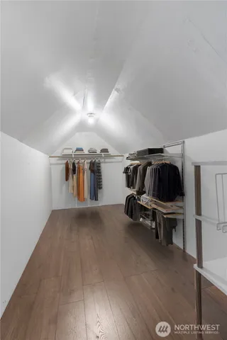 a view of a livingroom and a kitchen