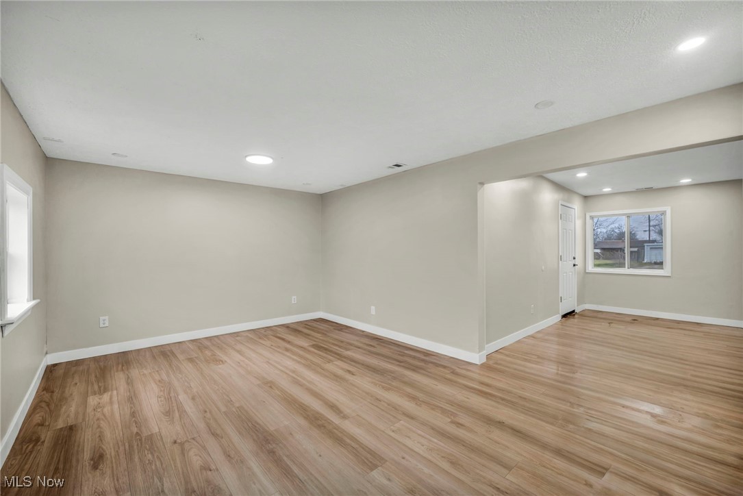 614 Weller Road Elyria, OH 44035 - Photo 23 of 39 Spare room featuring light wood finished floors and recessed lighting