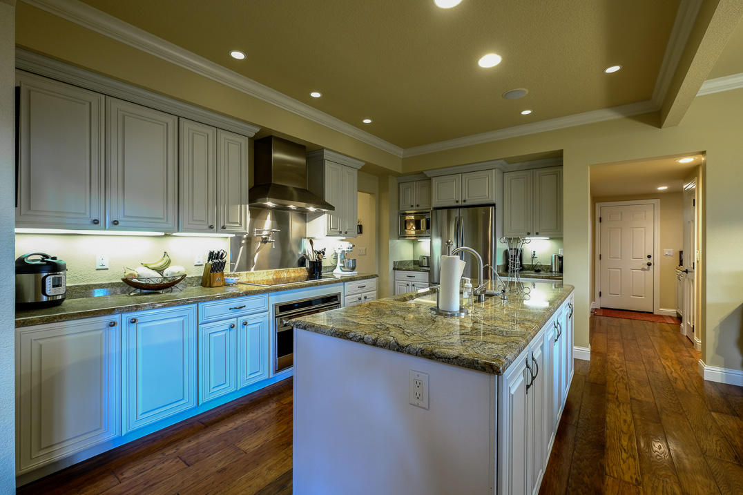 375 Hamilton Road Jacksonville, OR 97530 - Photo 9 of 47 a kitchen with sink cabinets and wooden floor