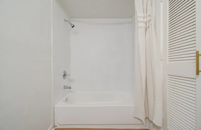 a bathroom with a bathtub