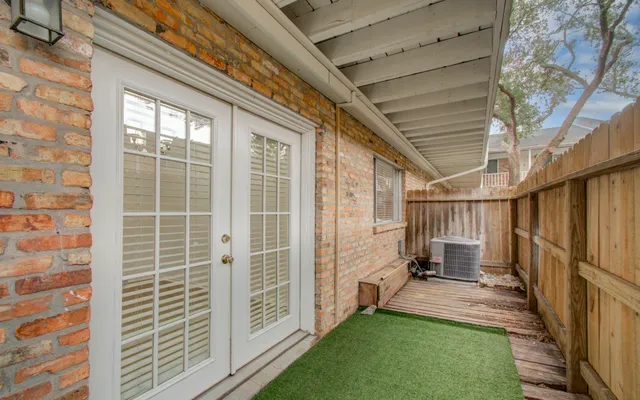 a view of a porch with a backyard