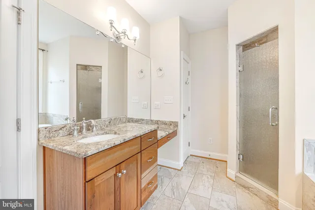 a view of a swimming pool with a lounge chair