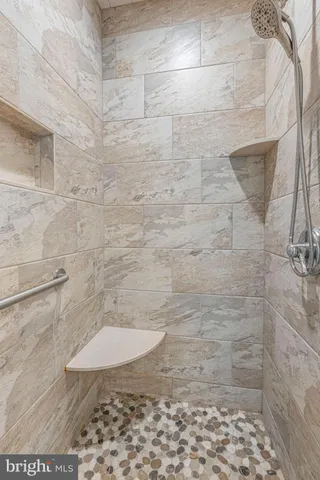 a view of a balcony with wooden floor