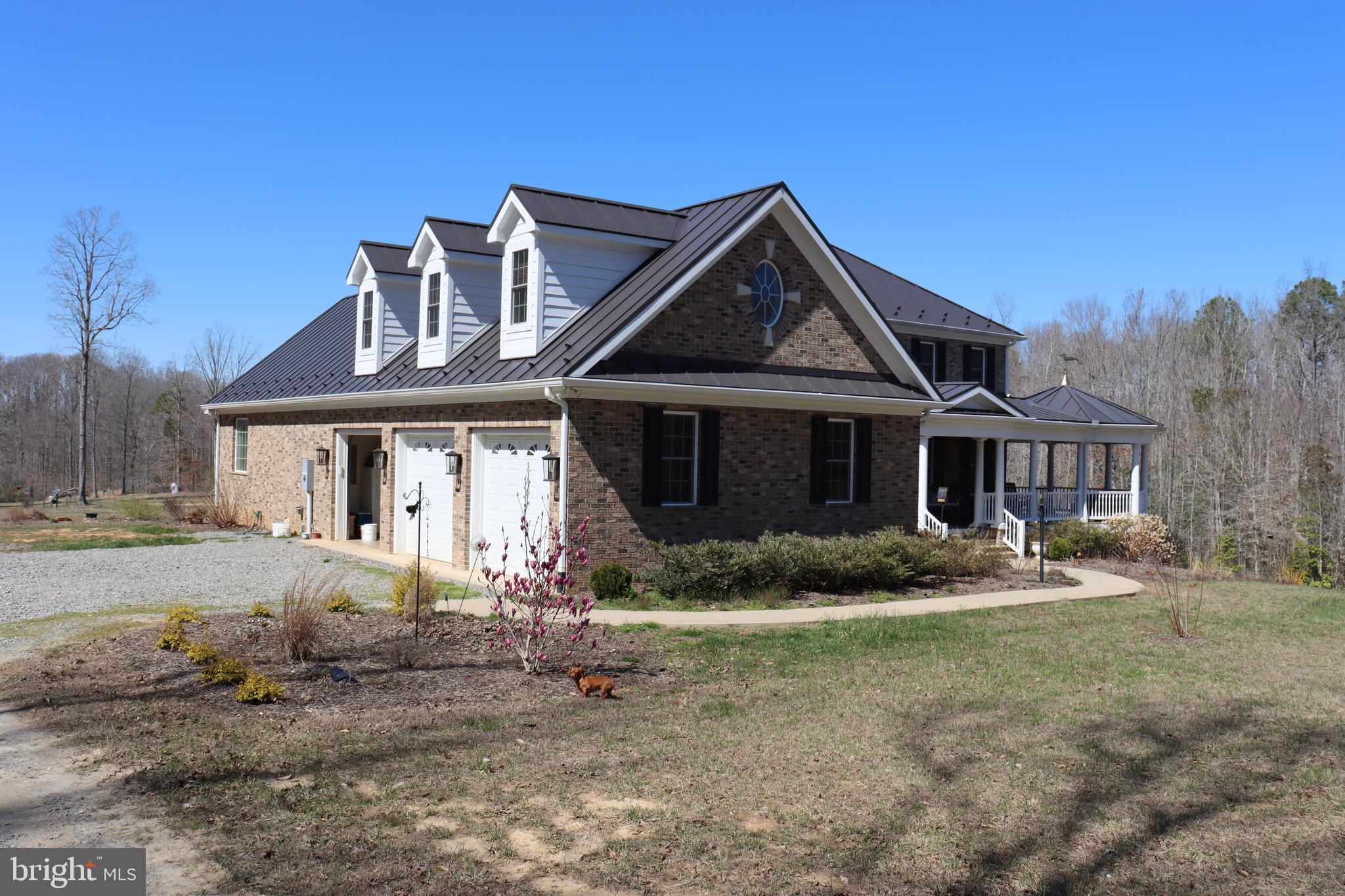 1185 Belle Meade Road Bumpass, VA 23024 - Photo 97 of 116 a front view of a house with a yard