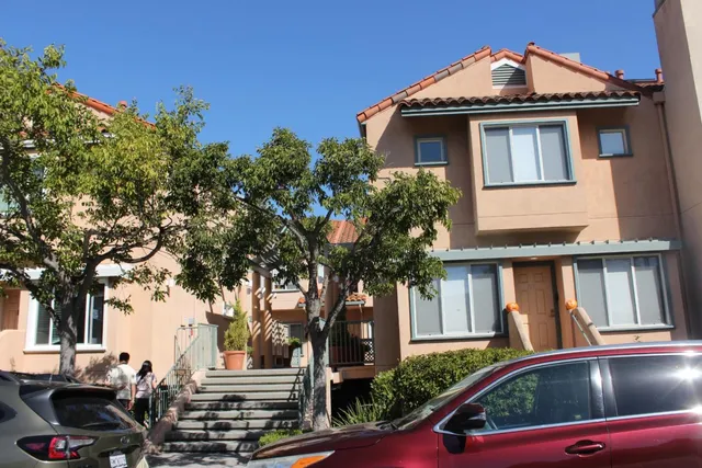 a view of street with large tree