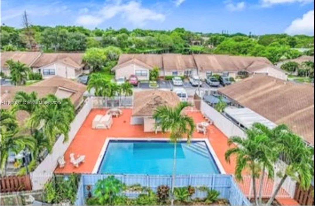 7680 Southwest 156th Court, Unit B115 Miami, FL 33193 - Photo 13 of 14 an aerial view of a house with a garden