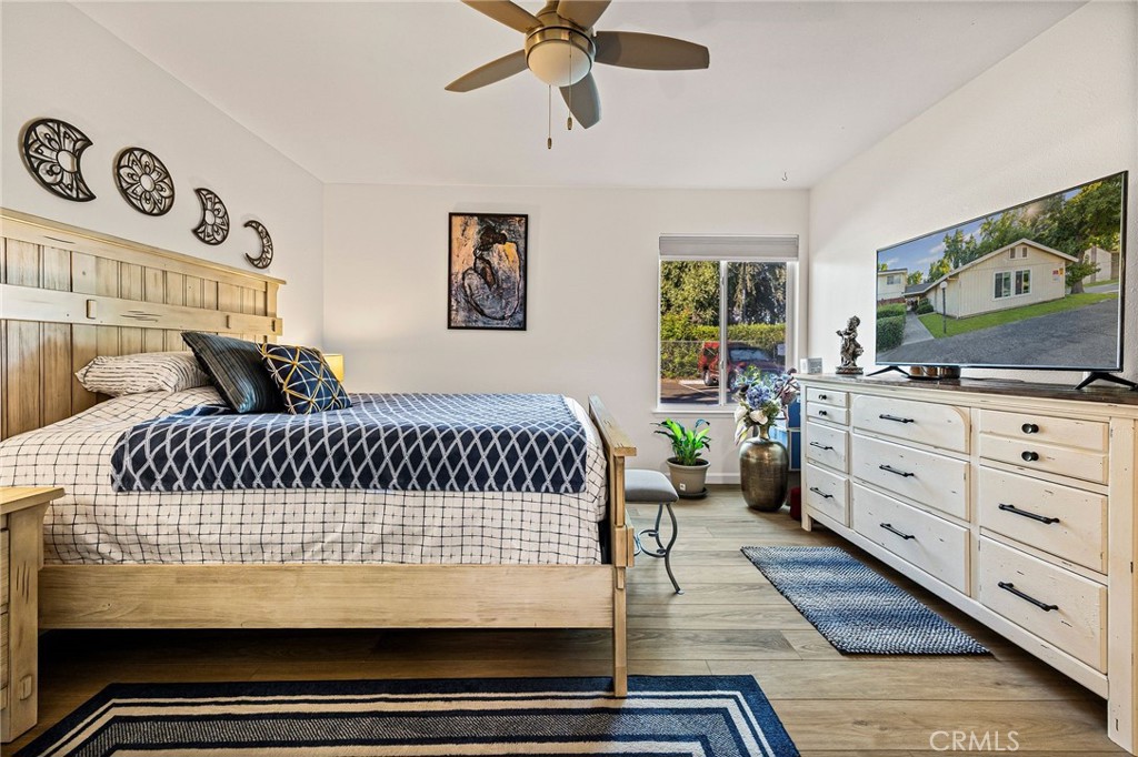 1397 Nord Avenue Chico, CA 95926 - Photo 12 of 18 a bedroom with a bed and a flat screen tv