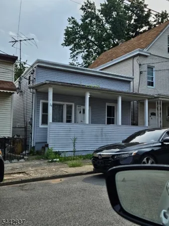 a view of a house with a patio