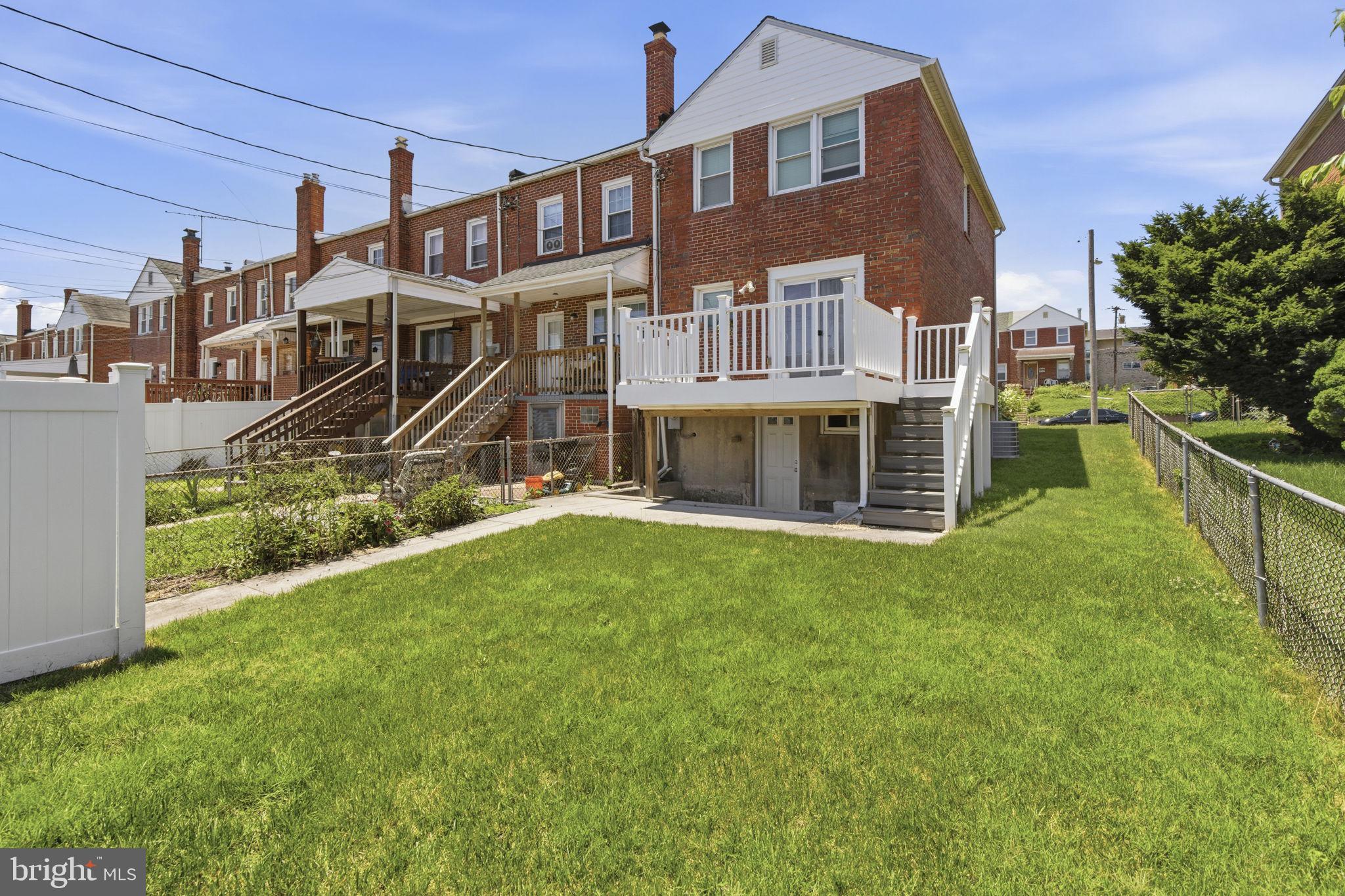 1627 Manor Road Baltimore, MD 21222 - Photo 20 of 24 Rear exterior with deck and yard