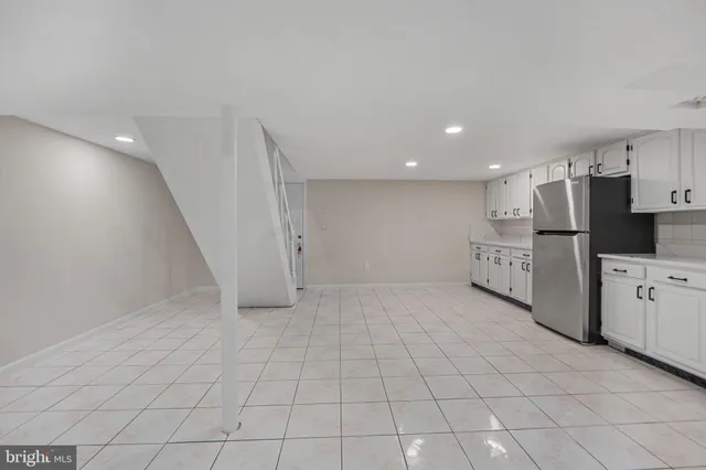 a view of a kitchen with a sink