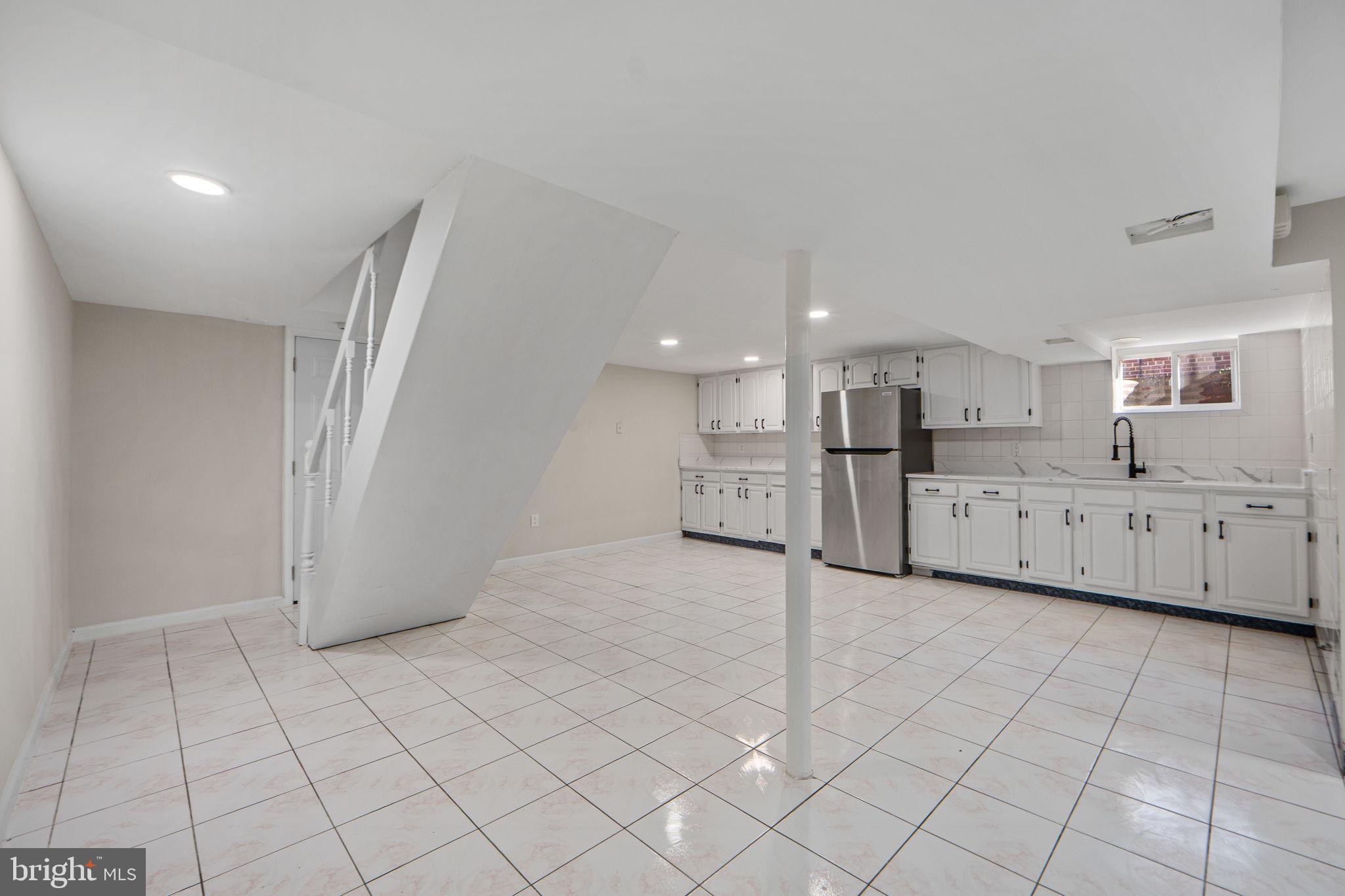 1513 Flora Lane Silver Spring, MD 20910 - Photo 29 of 50 a view of a kitchen with white cabinets