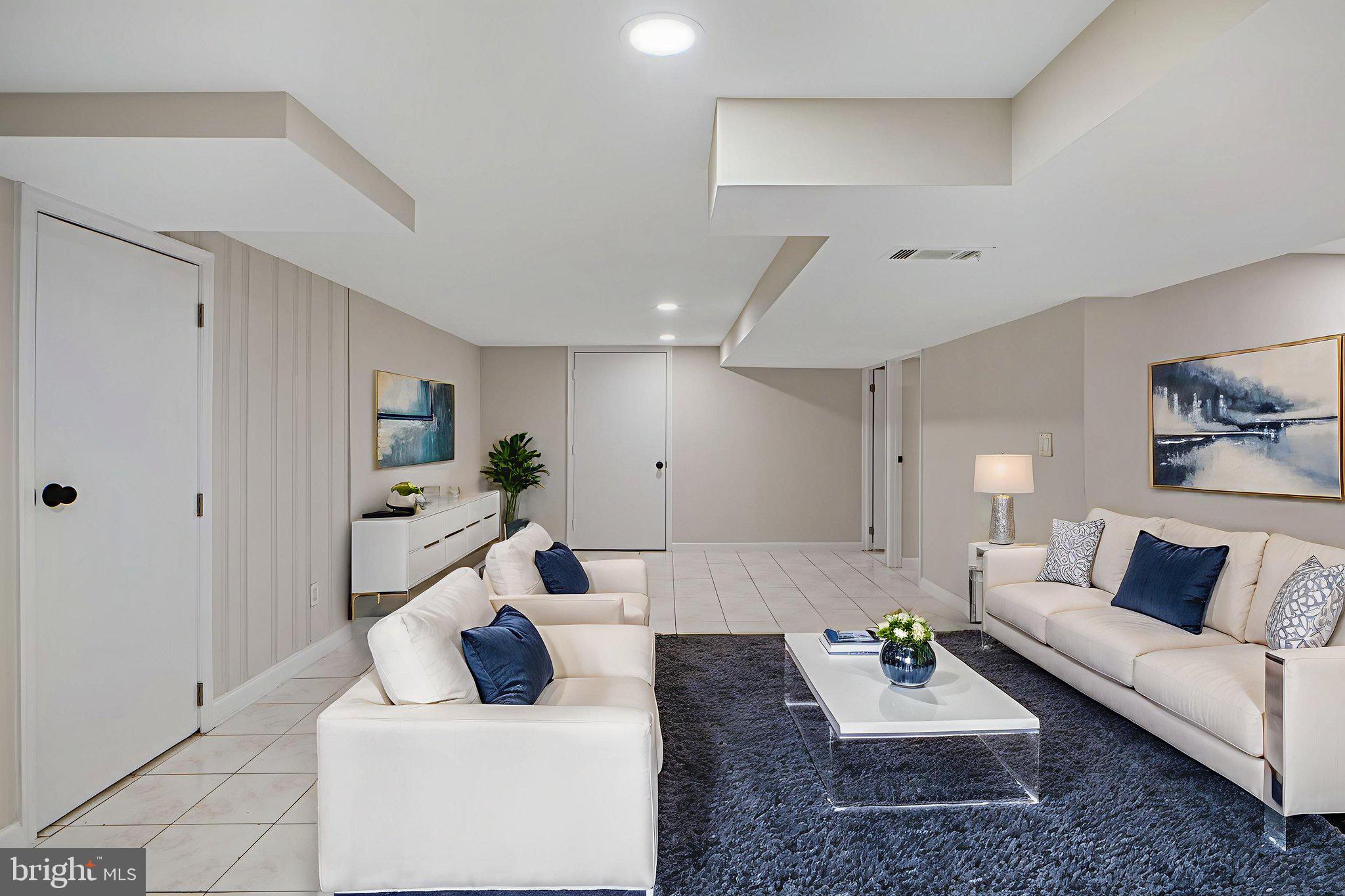 1513 Flora Lane Silver Spring, MD 20910 - Photo 35 of 50 a living room with furniture and a wooden floor