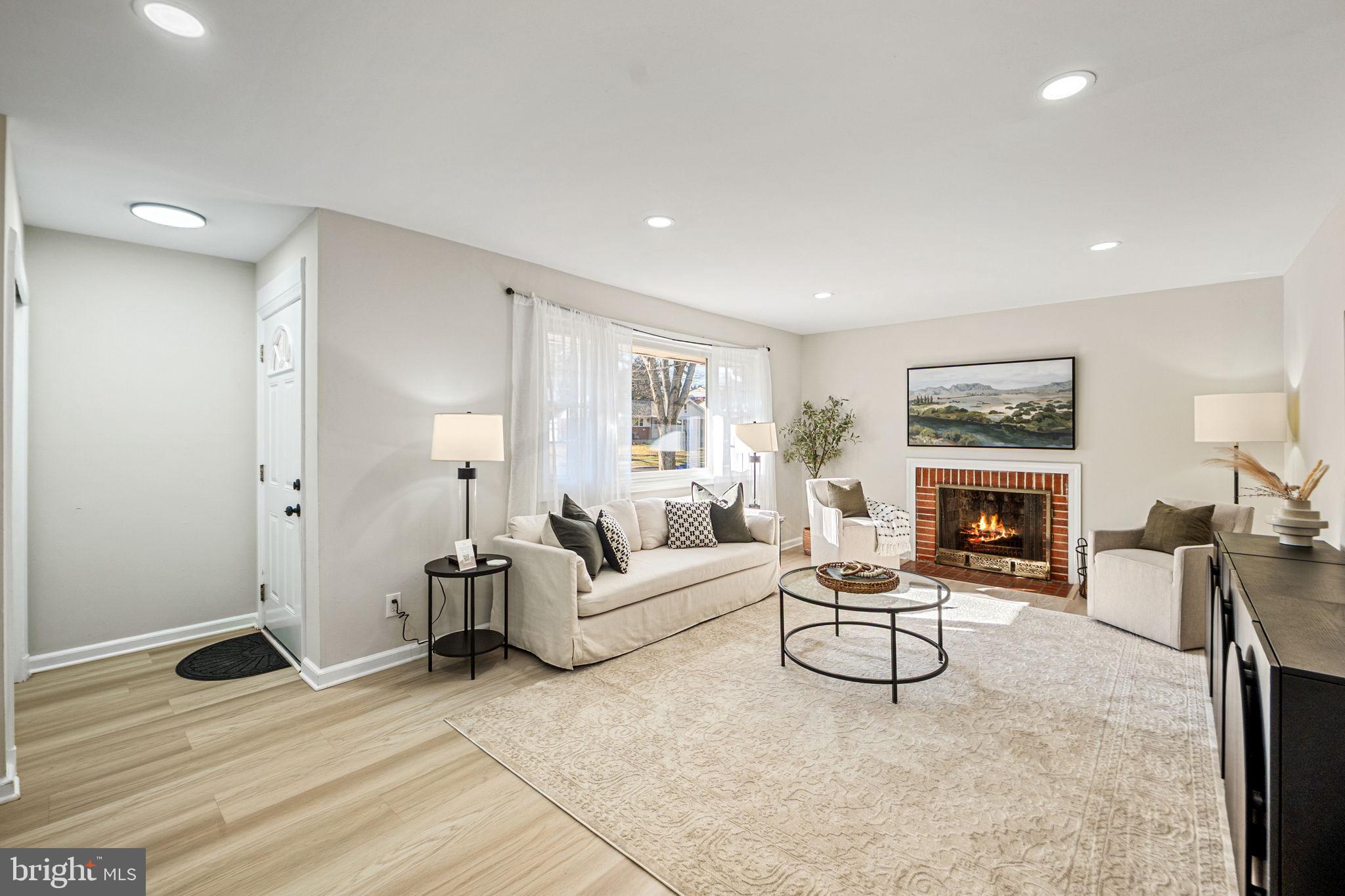 1513 Flora Lane Silver Spring, MD 20910 - Photo 4 of 50 a living room with furniture and a fireplace