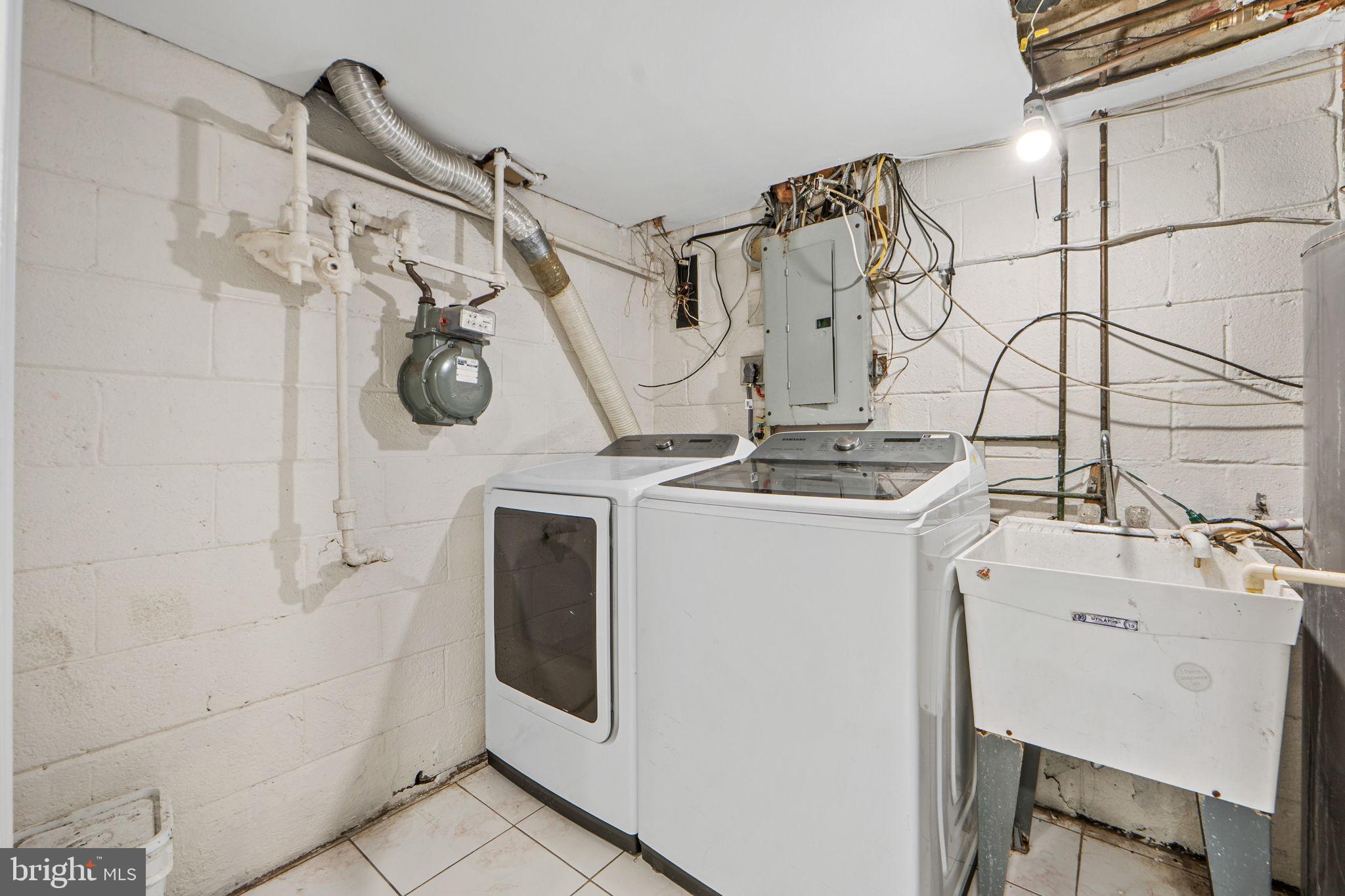 1513 Flora Lane Silver Spring, MD 20910 - Photo 43 of 50 a utility room with a shower and mirror