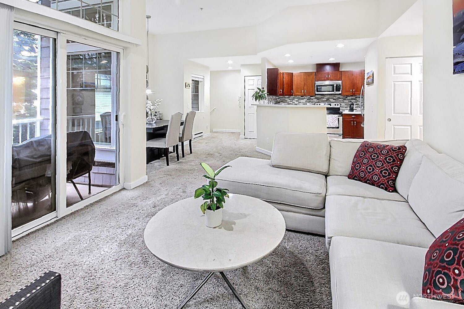 5921 South 234th Place Kent, WA 98032 - Photo 14 of 25 a living room with furniture and a kitchen