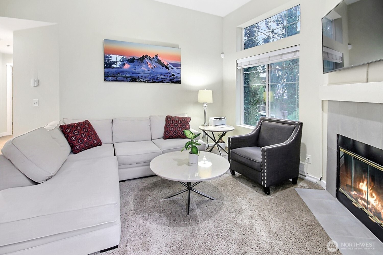 5921 South 234th Place Kent, WA 98032 - Photo 15 of 25 a living room with furniture and a fireplace