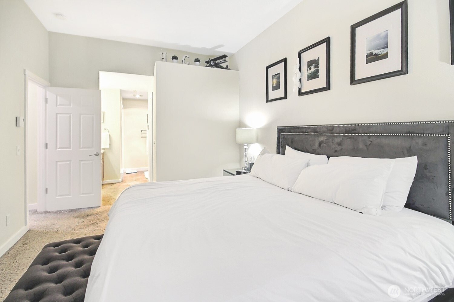 5921 South 234th Place Kent, WA 98032 - Photo 20 of 25 a bedroom with a bed and a mirror