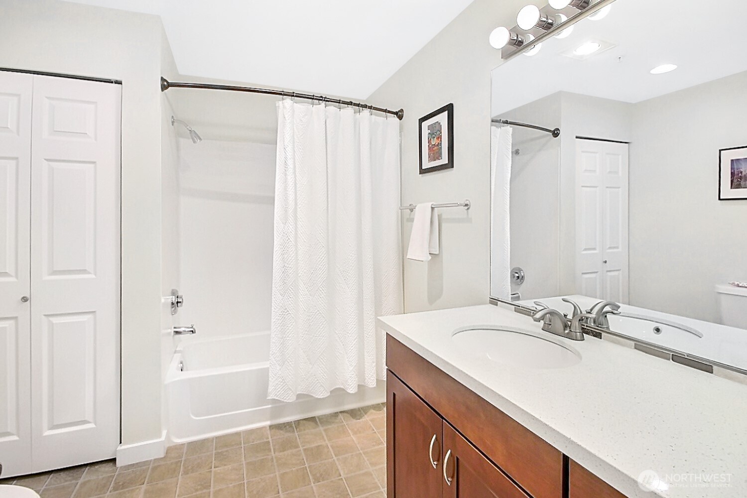 5921 South 234th Place Kent, WA 98032 - Photo 22 of 25 a bathroom with a sink double vanity and a mirror