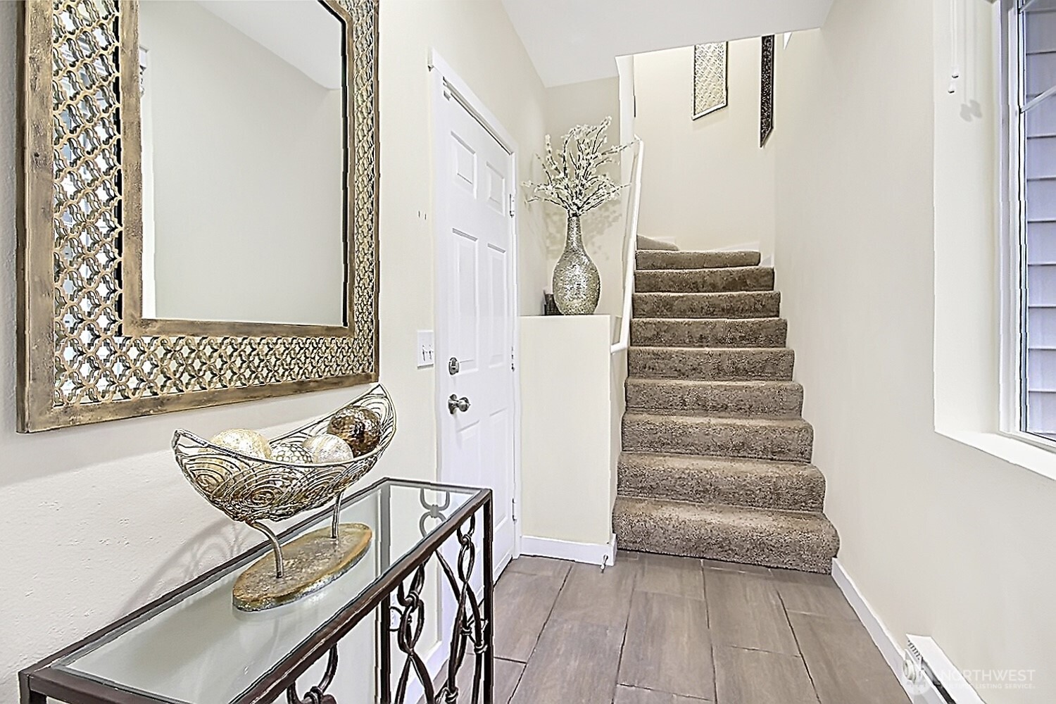 5921 South 234th Place Kent, WA 98032 - Photo 3 of 25 a view of a hallway with chairs and a window