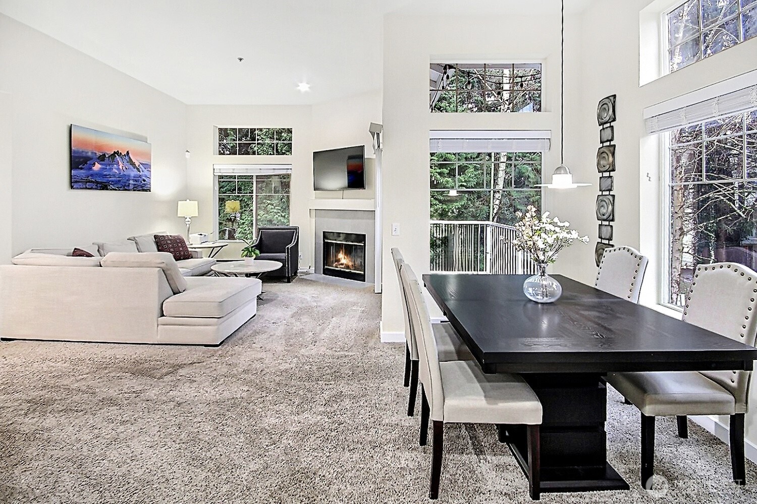 5921 South 234th Place Kent, WA 98032 - Photo 5 of 25 a living room with furniture a large window and a fireplace