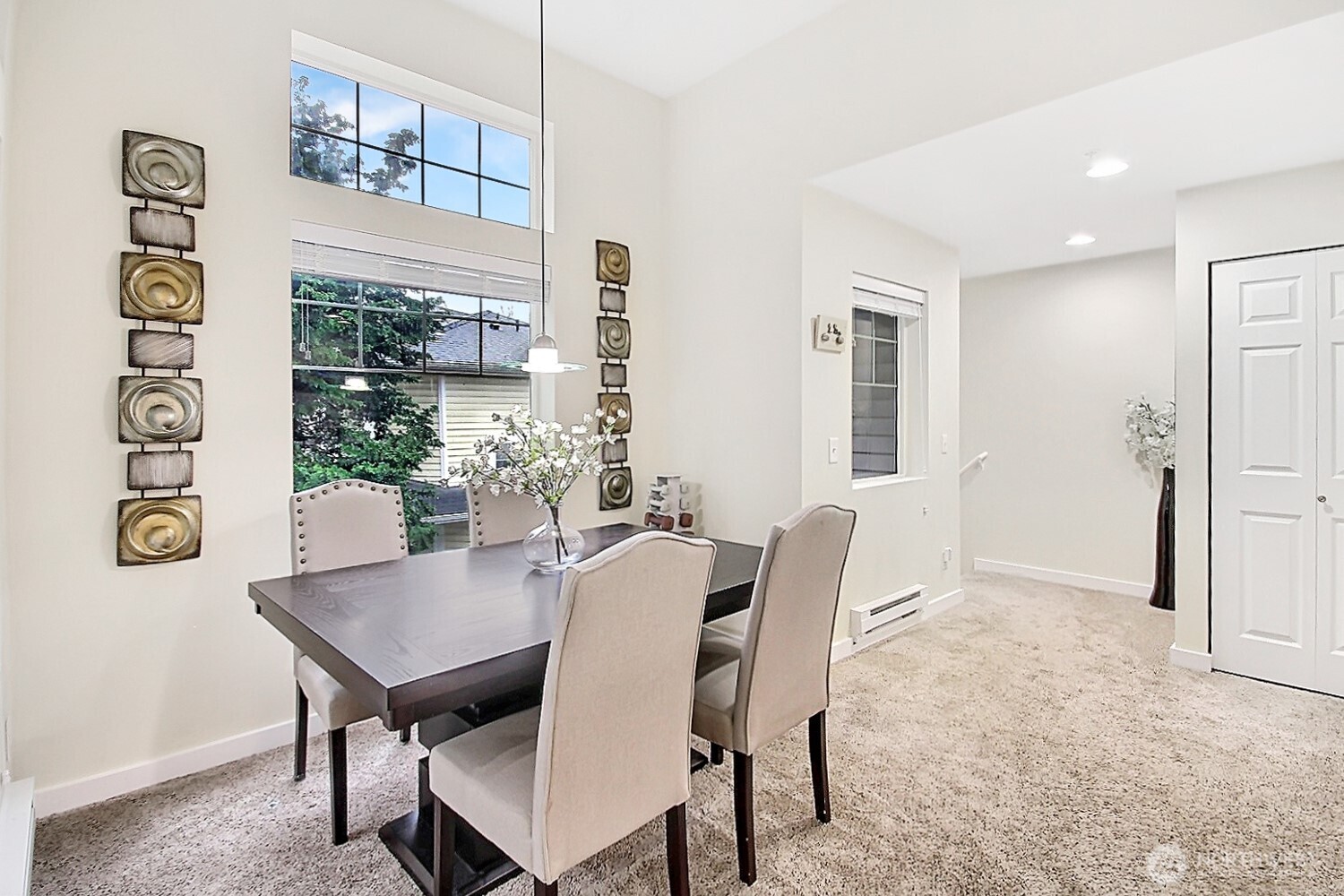 5921 South 234th Place Kent, WA 98032 - Photo 6 of 25 a view of a dining room with furniture window and outside view