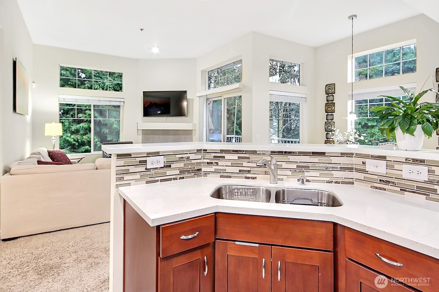 5921 South 234th Place Kent, WA 98032 - Photo 9 of 25 a kitchen with a sink and a stove top oven