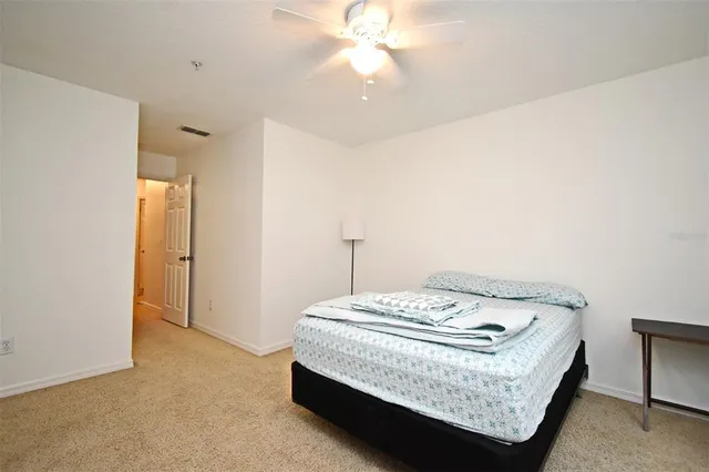 a bathroom with a double vanity sink and mirror